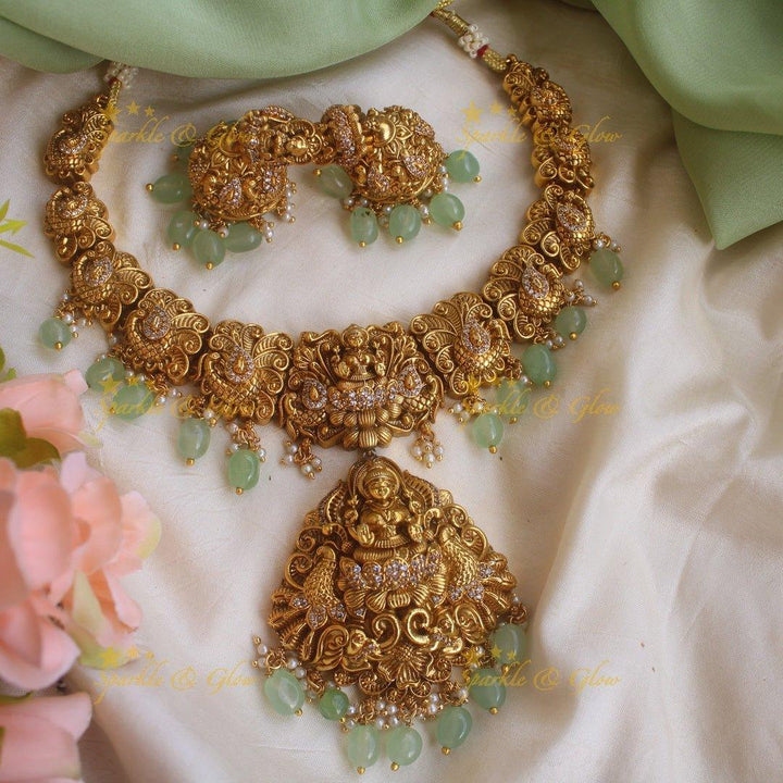 Stunning gold alike Lakshmi peacock carved short necklace with CZ stones and mint green beads - Sparkle and Glow