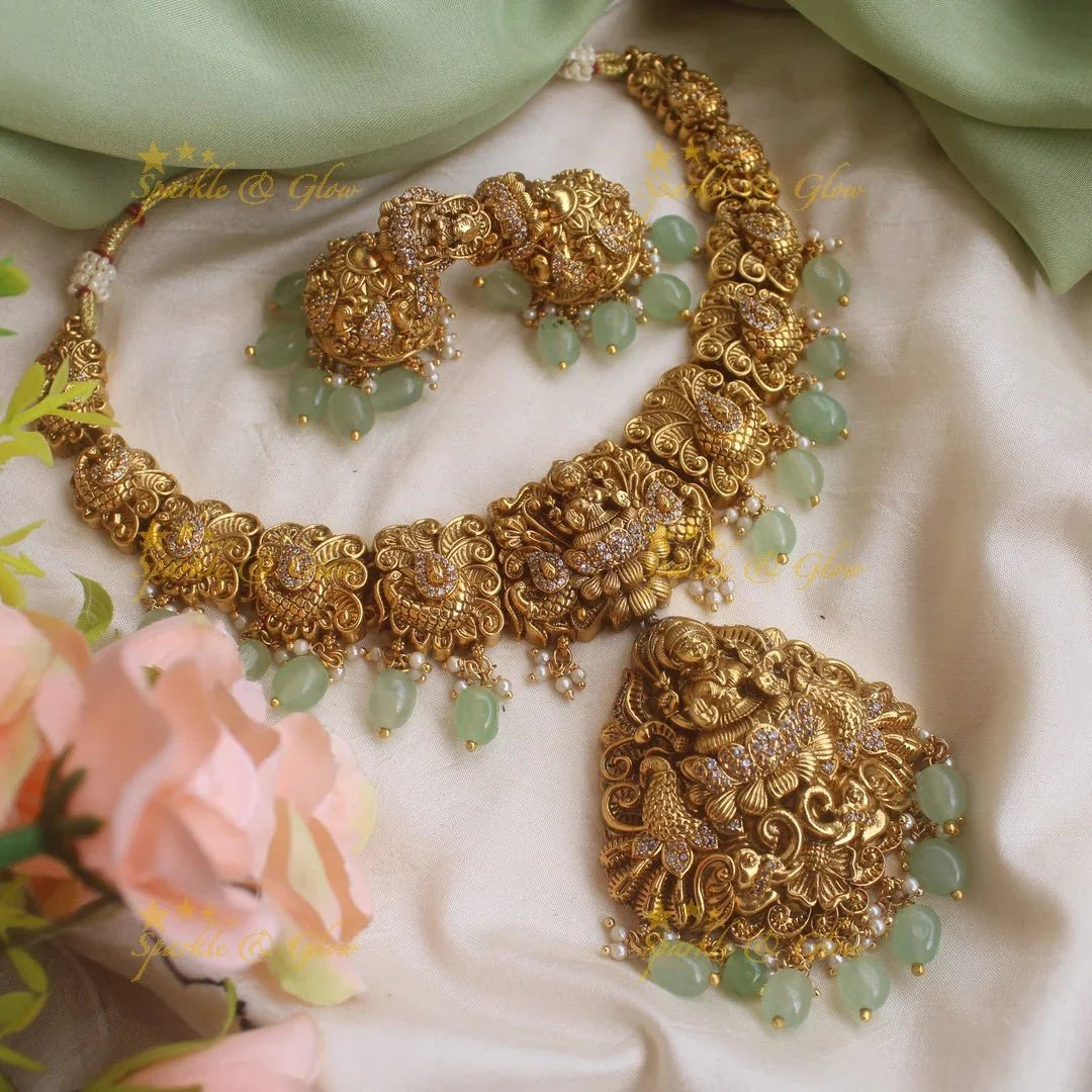 Stunning gold alike Lakshmi peacock carved short necklace with CZ stones and mint green beads - Sparkle and Glow