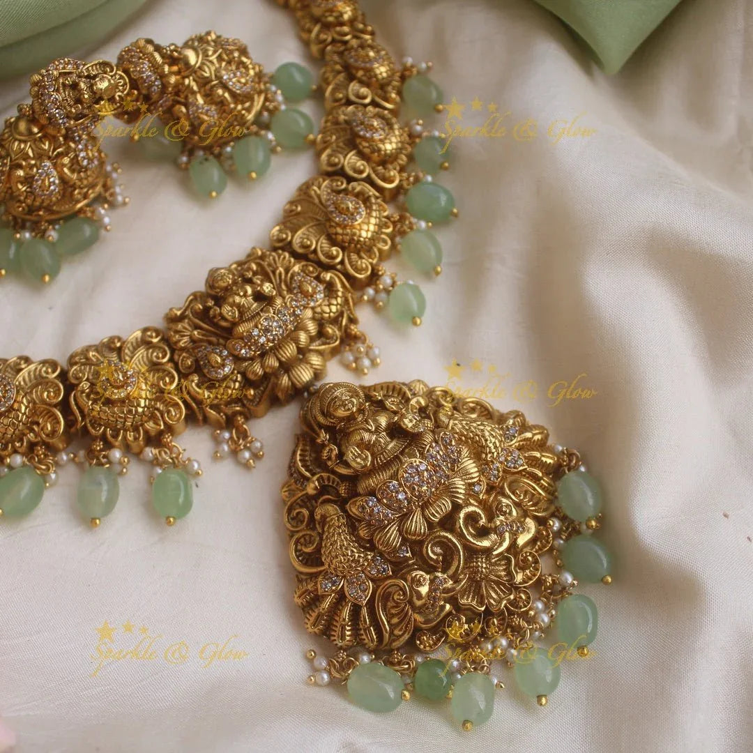 Stunning gold alike Lakshmi peacock carved short necklace with CZ stones and mint green beads - Sparkle and Glow