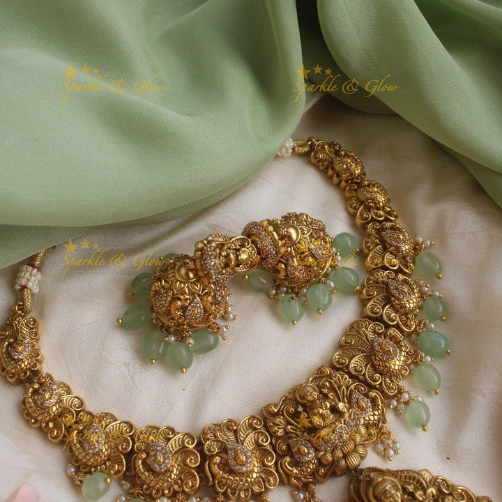 Stunning gold alike Lakshmi peacock carved short necklace with CZ stones and mint green beads - Sparkle and Glow