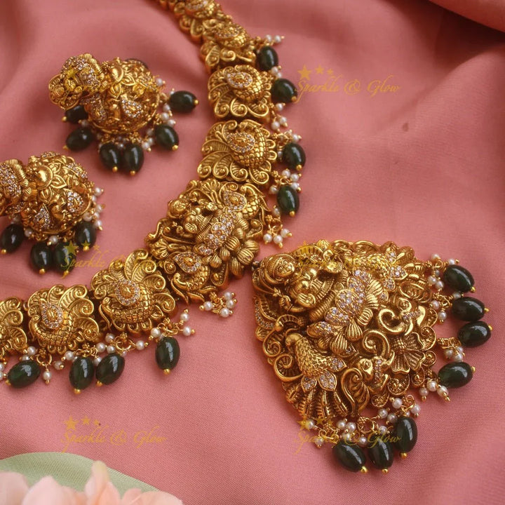 Stunning gold alike Lakshmi peacock carved short necklace with CZ stones and mint green beads - Sparkle and Glow