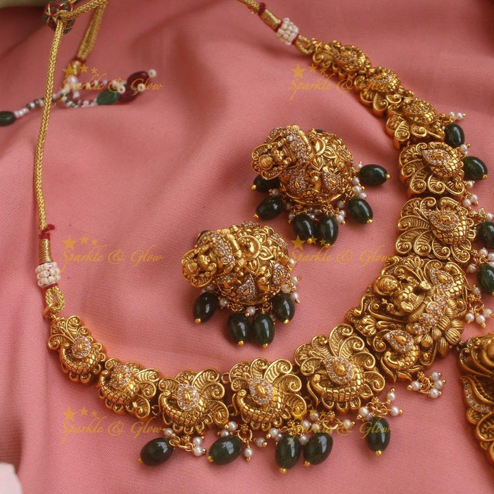 Stunning gold alike Lakshmi peacock carved short necklace with CZ stones and mint green beads - Sparkle and Glow