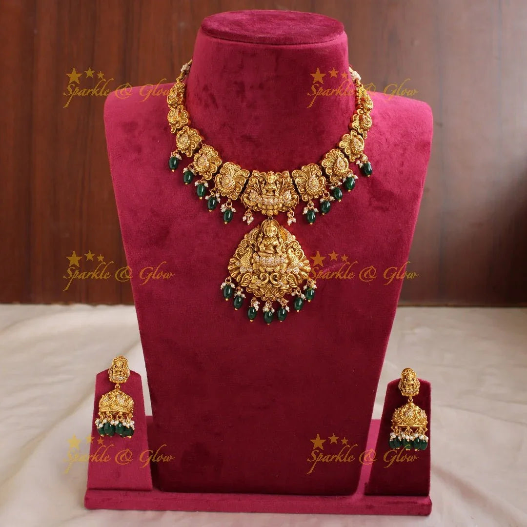 Stunning gold alike Lakshmi peacock carved short necklace with CZ stones and mint green beads - Sparkle and Glow