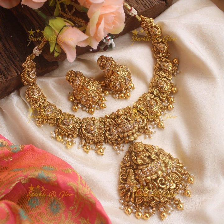 Stunning gold alike Lakshmi peacock carved short necklace with CZ stones and mint green beads - Sparkle and Glow