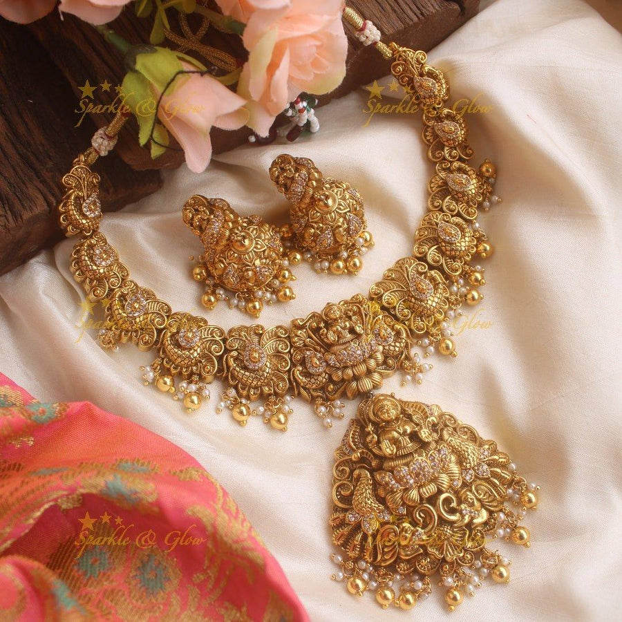 Stunning gold alike Lakshmi peacock carved short necklace with CZ stones and mint green beads - Sparkle and Glow