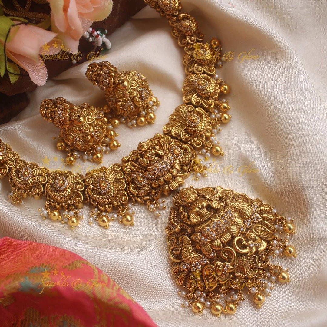 Stunning gold alike Lakshmi peacock carved short necklace with CZ stones and mint green beads - Sparkle and Glow