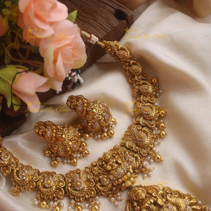 Stunning gold alike Lakshmi peacock carved short necklace with CZ stones and mint green beads - Sparkle and Glow