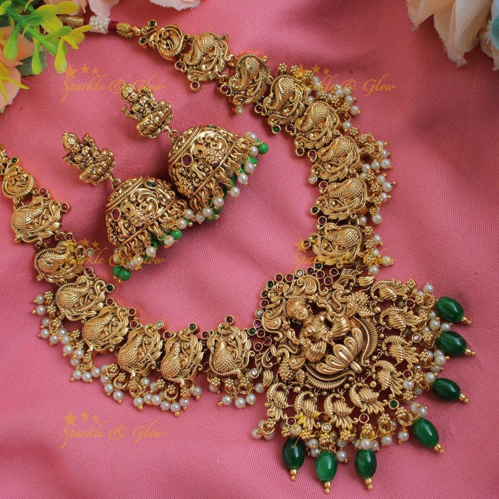 Beautiful Lakshmi peacock carved short necklace with stones and green beads - Sparkle and Glow