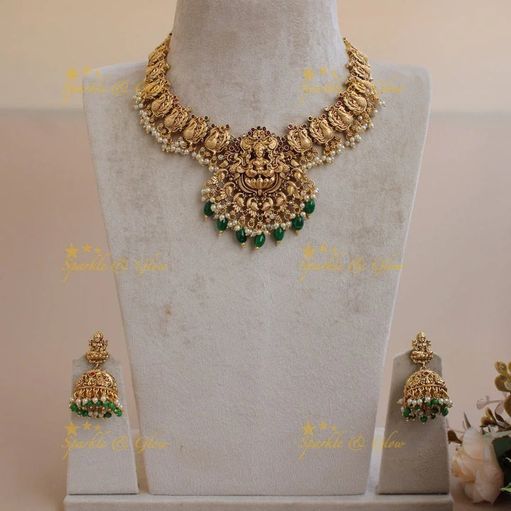 Beautiful Lakshmi peacock carved short necklace with stones and green beads - Sparkle and Glow