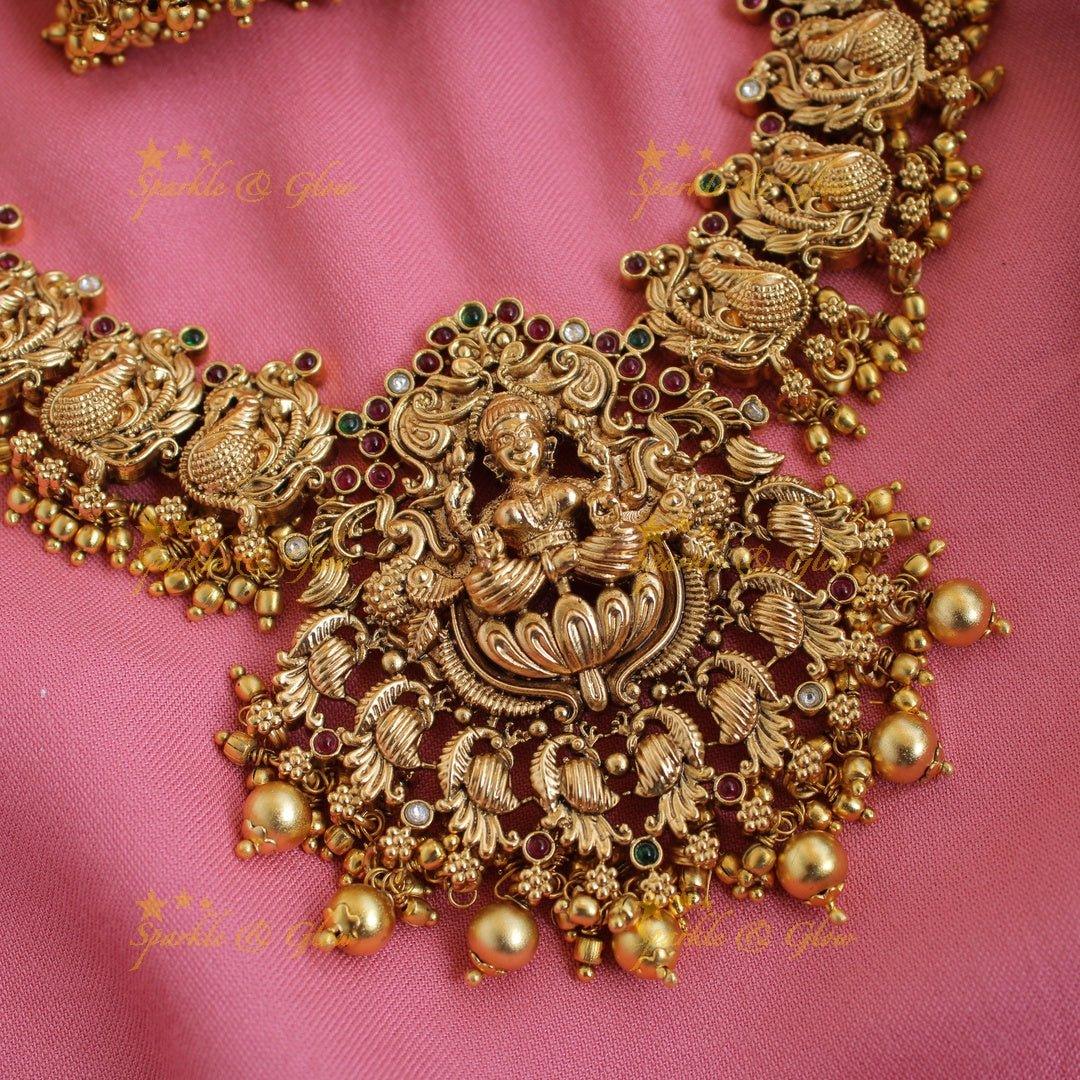 Beautiful Lakshmi peacock carved short necklace with stones and green beads - Sparkle and Glow