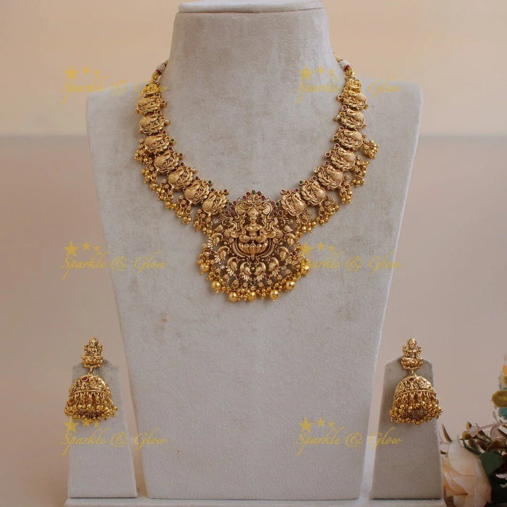 Beautiful Lakshmi peacock carved short necklace with stones and green beads - Sparkle and Glow