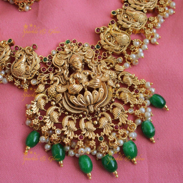 Grand exclusive Lakshmi peacock carved long necklace with stones and green beads - Sparkle and Glow