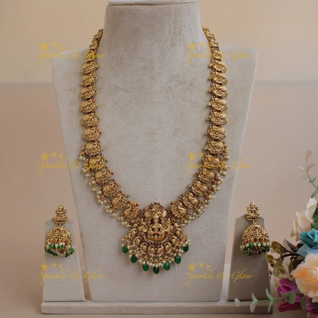 Grand exclusive Lakshmi peacock carved long necklace with stones and green beads - Sparkle and Glow