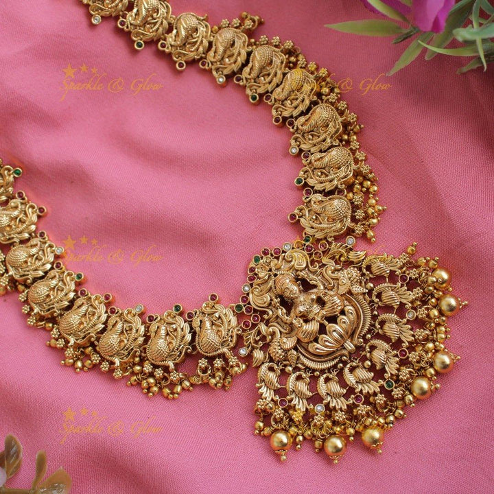 Grand exclusive Lakshmi peacock carved long necklace with stones and green beads - Sparkle and Glow