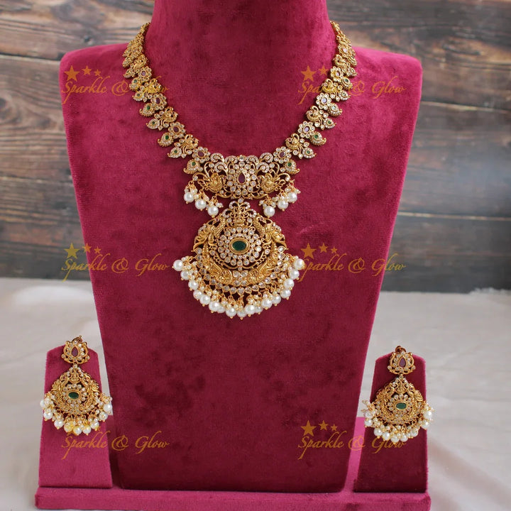 Statement Lakshmi peacock floral design mango short necklace with CZ stones pearls ruby and emerald - Sparkle and Glow
