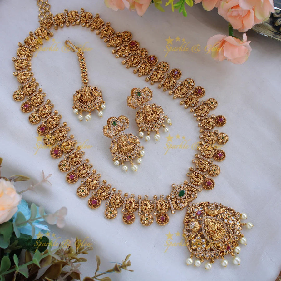 Statement Lakshmi peacock flower carved long necklace with CZ stones and pearl with maang tikka - Sparkle and Glow
