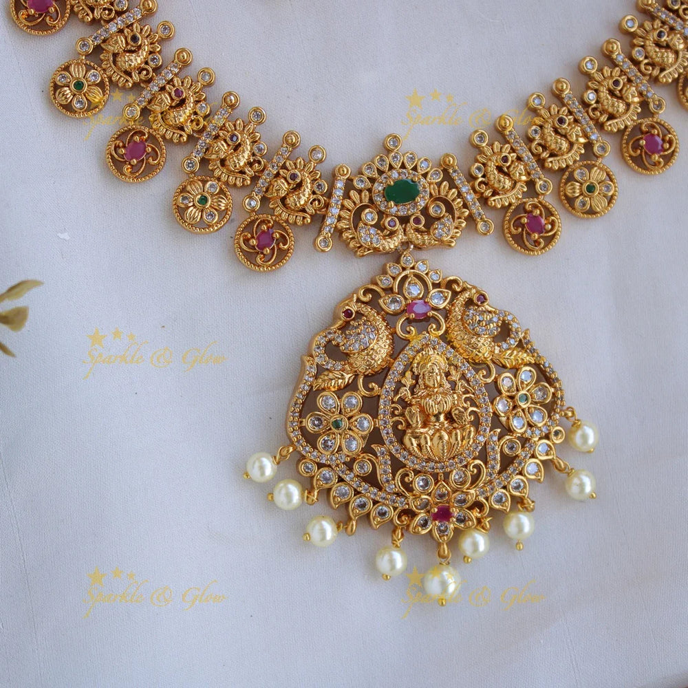 Statement Lakshmi peacock flower carved long necklace with CZ stones and pearl with maang tikka - Sparkle and Glow
