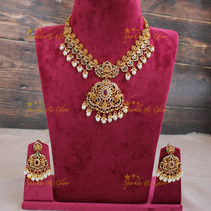 Elegant Lakshmi Peacock carved gutta pusalu long necklace with CZ stones ruby and emerald