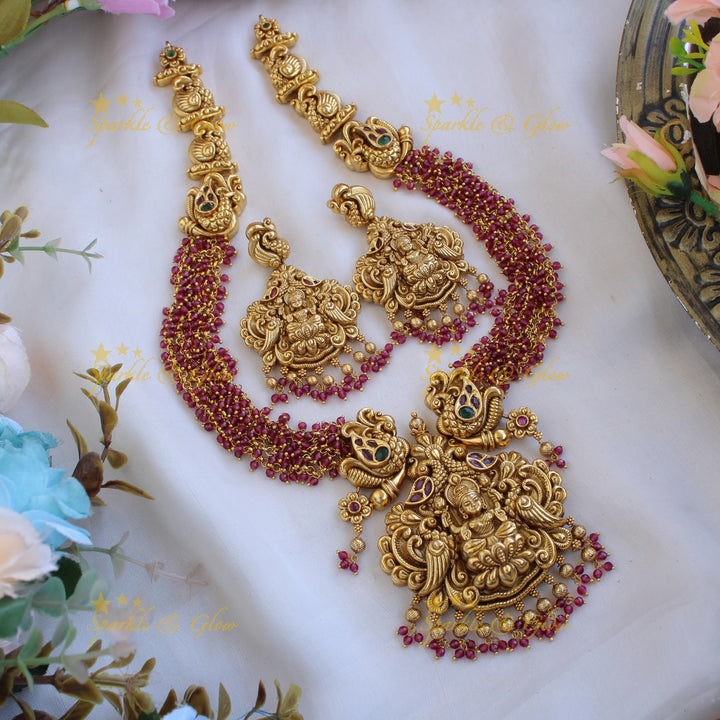 Grand intricate Lakshmi peacock carved long necklace with cluster beads - red