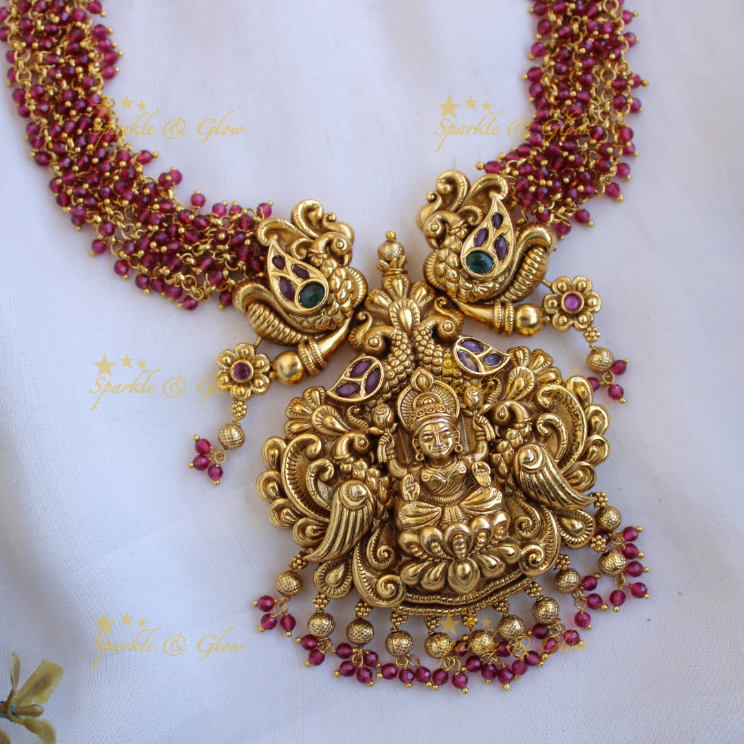 Grand intricate Lakshmi peacock carved long necklace with cluster beads - red