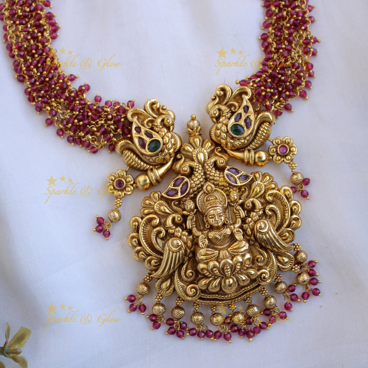 Grand intricate Lakshmi peacock carved long necklace with cluster beads - red