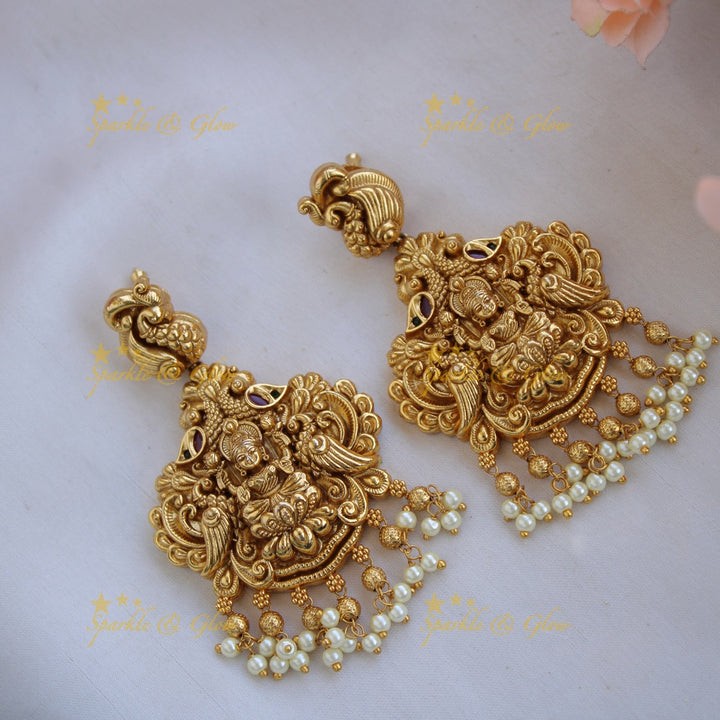 Grand intricate Lakshmi peacock carved long necklace with cluster pearls