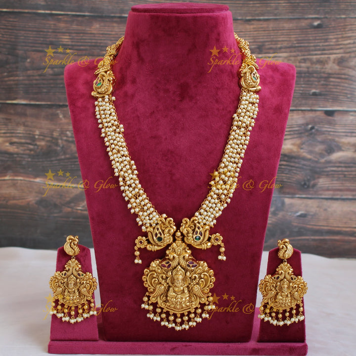 Grand intricate Lakshmi peacock carved long necklace with cluster pearls