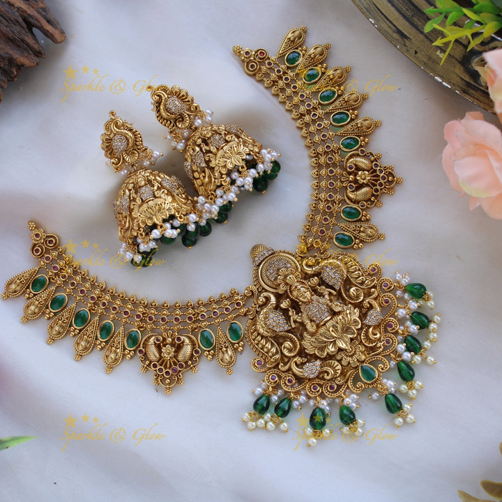 Elegant Lakshmi peacock carved short necklace with CZ stones and green beads
