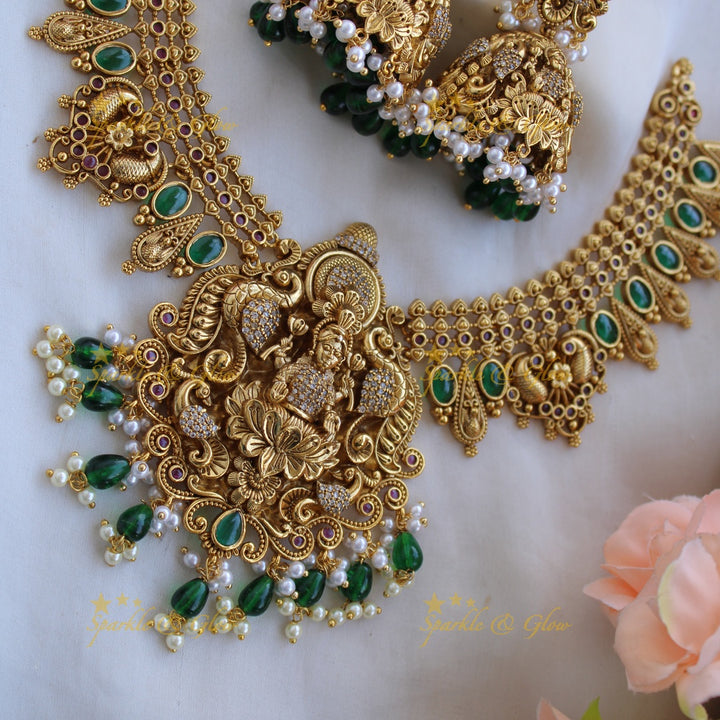 Elegant Lakshmi peacock carved short necklace with CZ stones and green beads