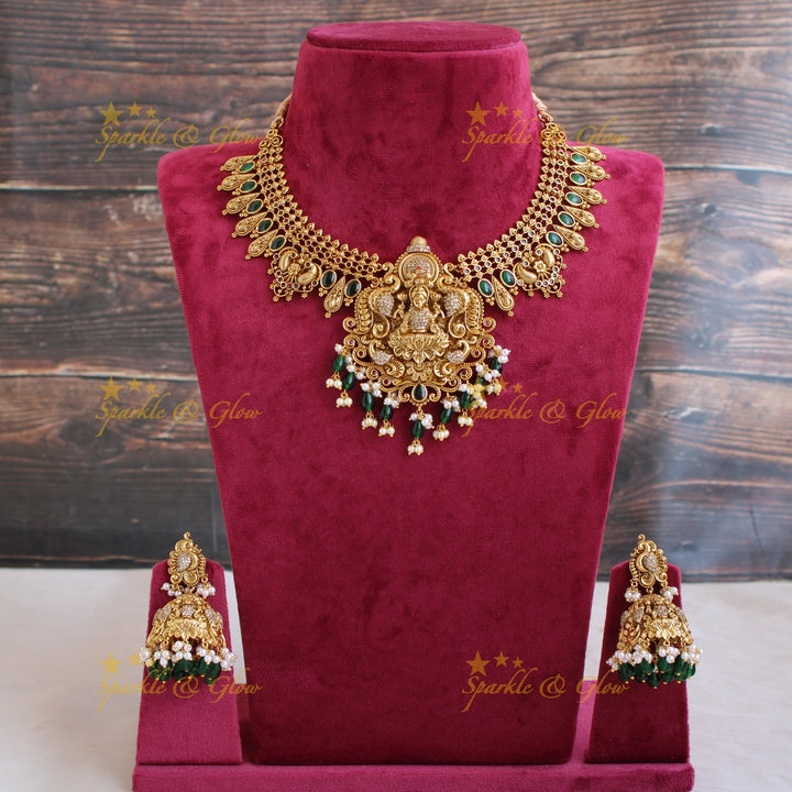 Elegant Lakshmi peacock carved short necklace with CZ stones and green beads