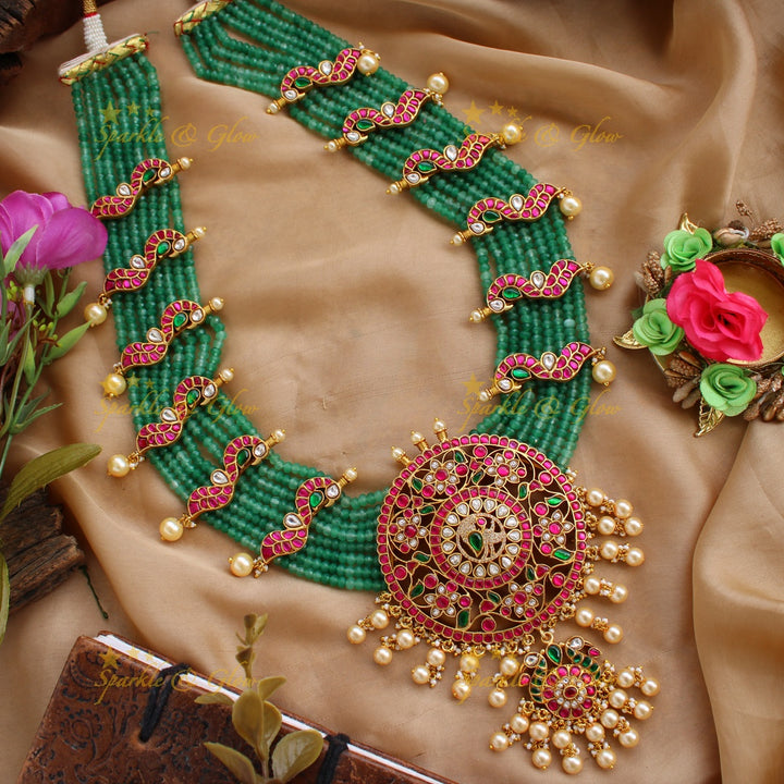 Exclusive Peacock floral design jadau Rani haram with multi layer green beads chain and pearls