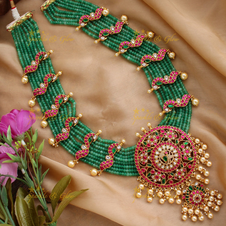 Exclusive Peacock floral design jadau Rani haram with multi layer green beads chain and pearls