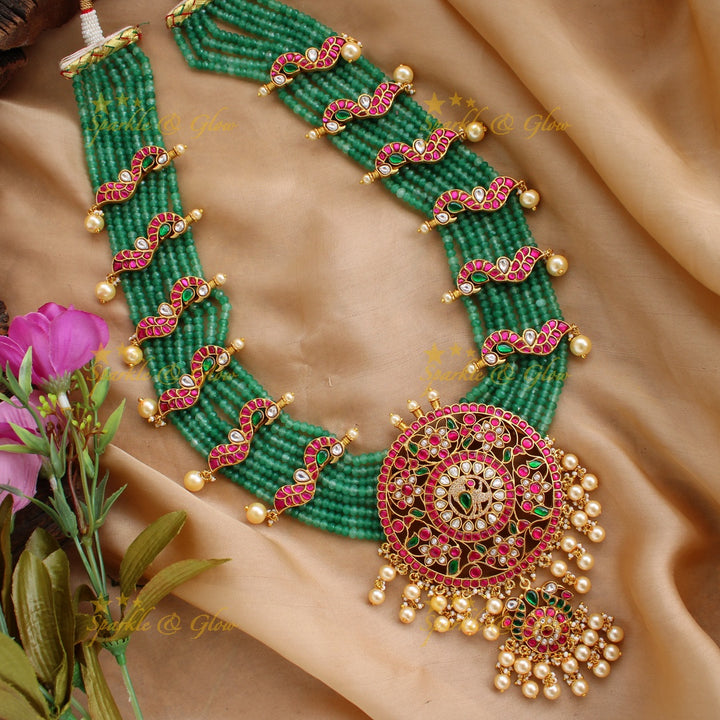 Exclusive Peacock floral design jadau Rani haram with multi layer green beads chain and pearls