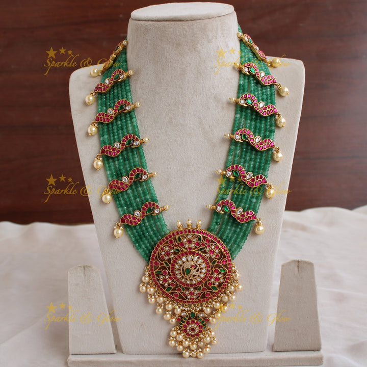 Exclusive Peacock floral design jadau Rani haram with multi layer green beads chain and pearls