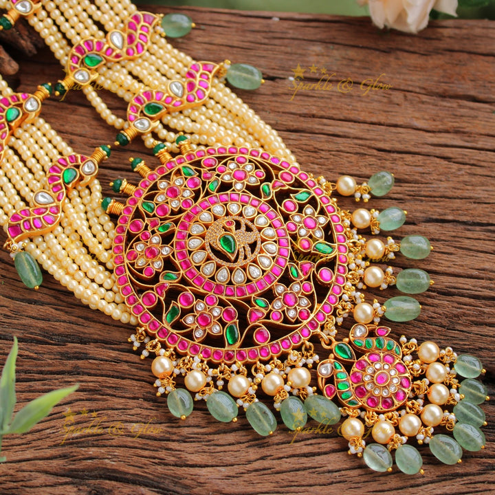 Exclusive Peacock floral design jadau Rani haram with multi layer pearl chain and green beads