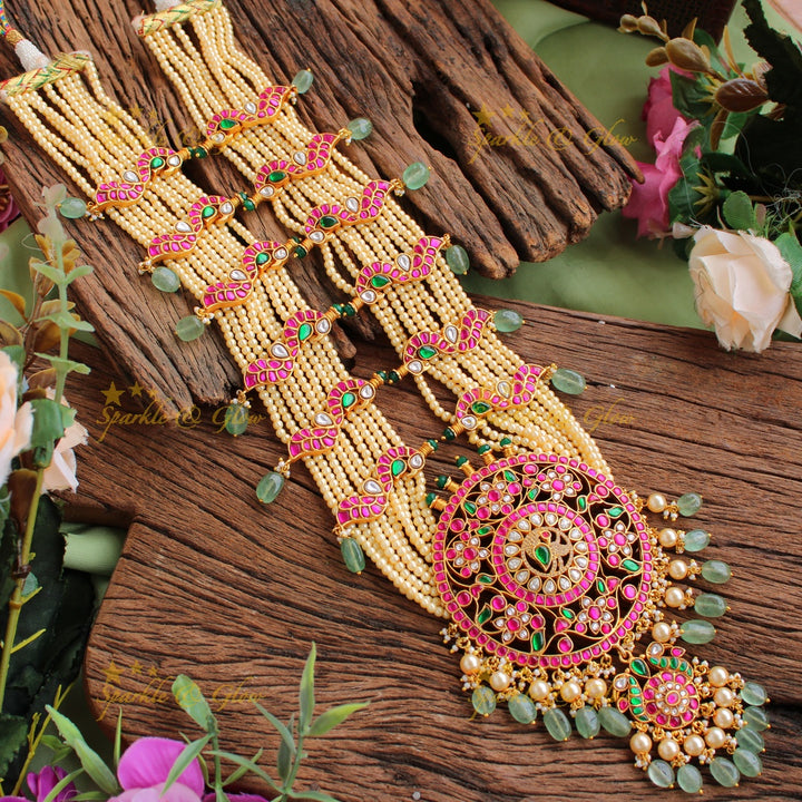 Exclusive Peacock floral design jadau Rani haram with multi layer pearl chain and green beads