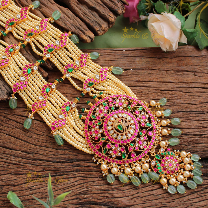 Exclusive Peacock floral design jadau Rani haram with multi layer pearl chain and green beads