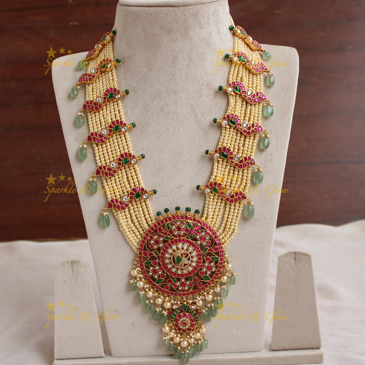 Exclusive Peacock floral design jadau Rani haram with multi layer pearl chain and green beads