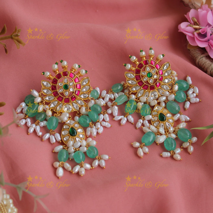 Exclusive grand Peacock and floral jadau long necklace with green beads and rice pearls