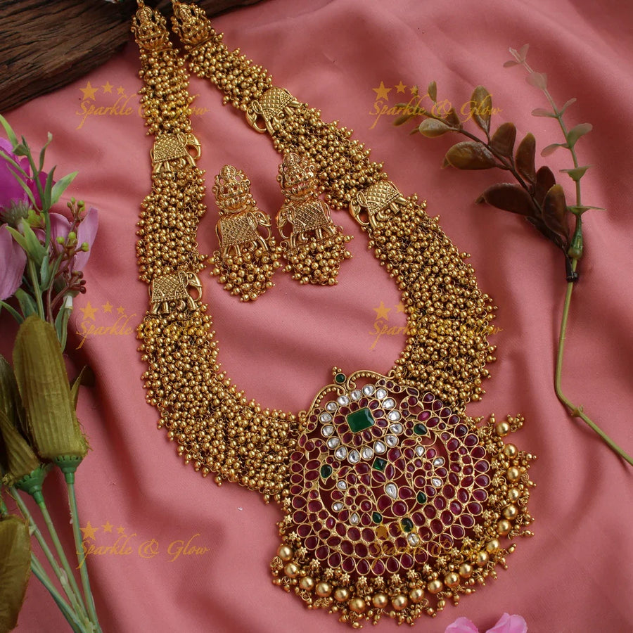 Gorgeous kemp stone pendent elephant carved long necklace with gold cluster - Sparkle and Glow
