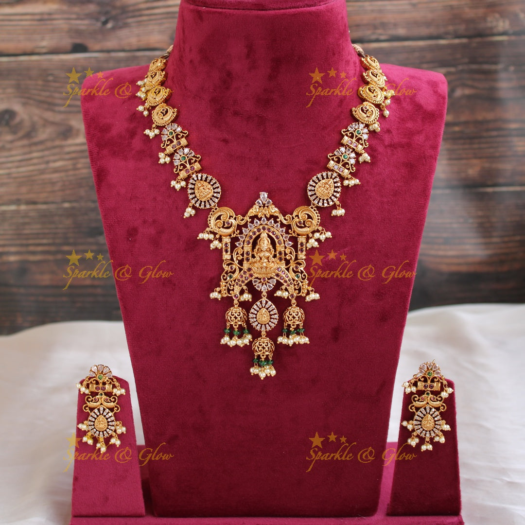 Exquisite Lakshmi peacock floral design CZ stone short necklace with ruby emerald and pearls