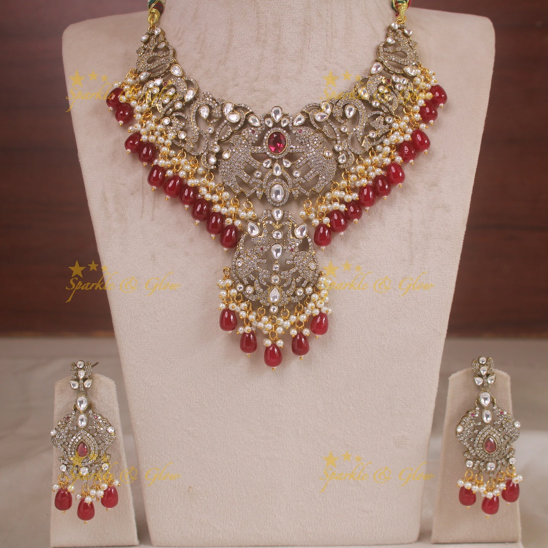 Stunning elephant design victorian AD short necklace with pearls and red beads