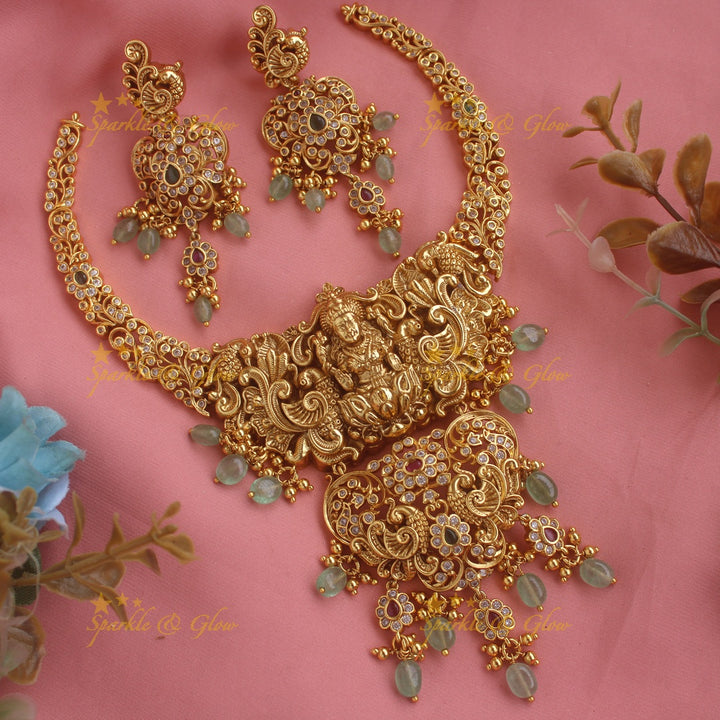 Exclusive Lakshmi peacock flower carved short necklace with multi colour stones and mint green beads