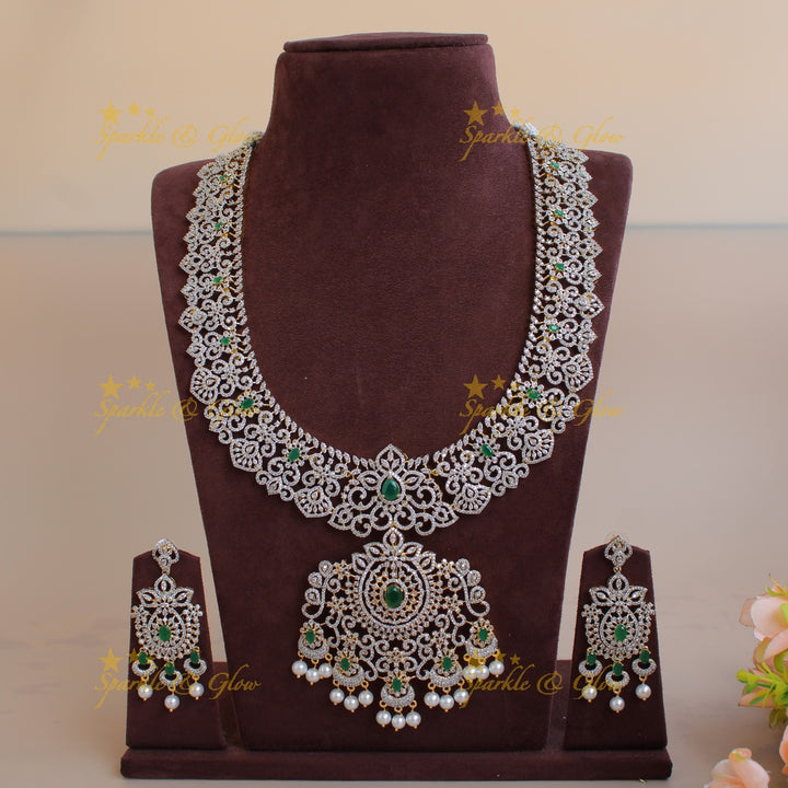 Grand floral leaf design American diamond long necklace with emerald and pearl drops - green