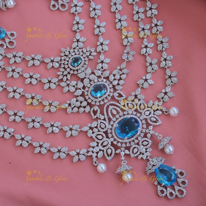 Stunning Floral design American diamond layer haram with jhumuka drops - Blue
