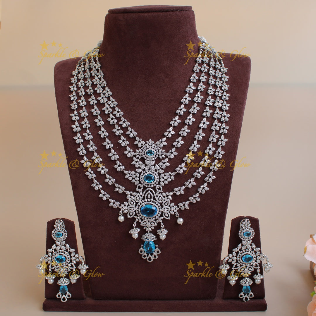 Stunning Floral design American diamond layer haram with jhumuka drops - Blue