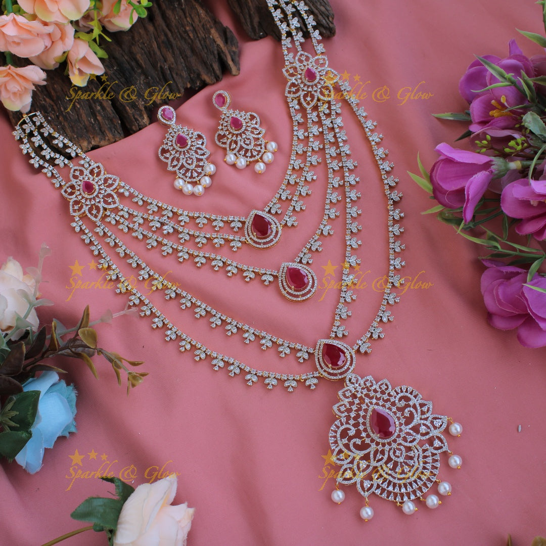 Gorgeous Floral pendent leaflet design American diamond layer haram with pearls and emerald