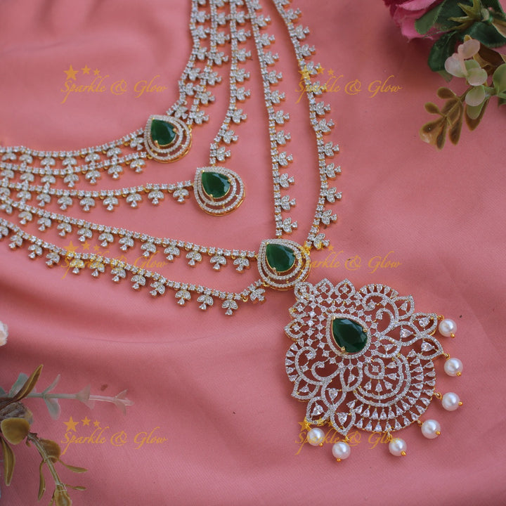 Gorgeous Floral pendent leaflet design American diamond layer haram with pearls and emerald