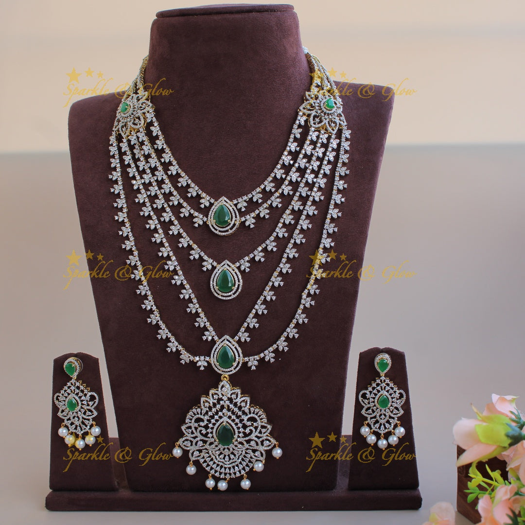 Gorgeous Floral pendent leaflet design American diamond layer haram with pearls and emerald