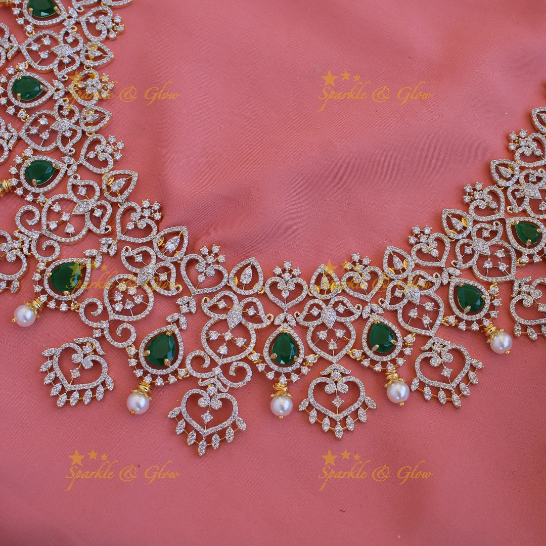 Grand intricate floral leaflet design American diamond long necklace with emerald and pearls - green